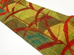 手織り真綿紬草葉に抽象模様織出し名古屋帯